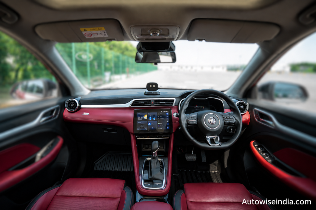 MG Astor interior dashboard with ADAS infotainment system and red leather cabin
